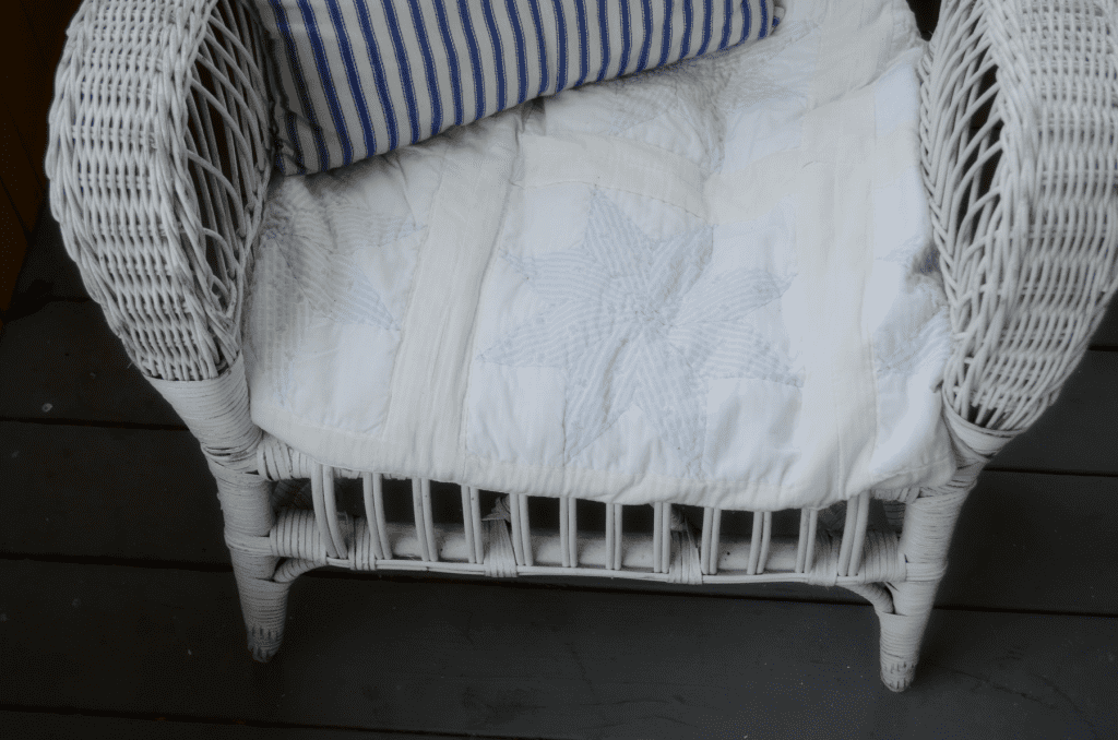 Wicker chair with quilt cover
