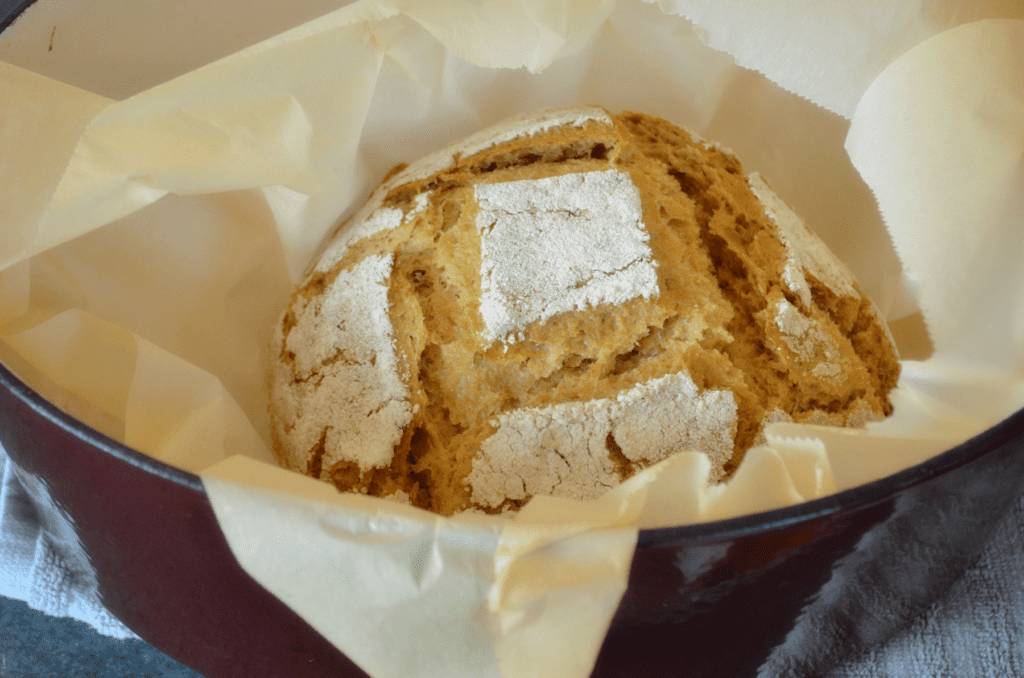 Finished Boule in parchment lined Dutch oven