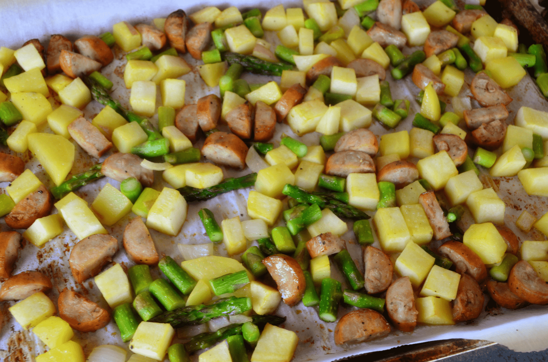 sheet pan meal of asparagus and sausage