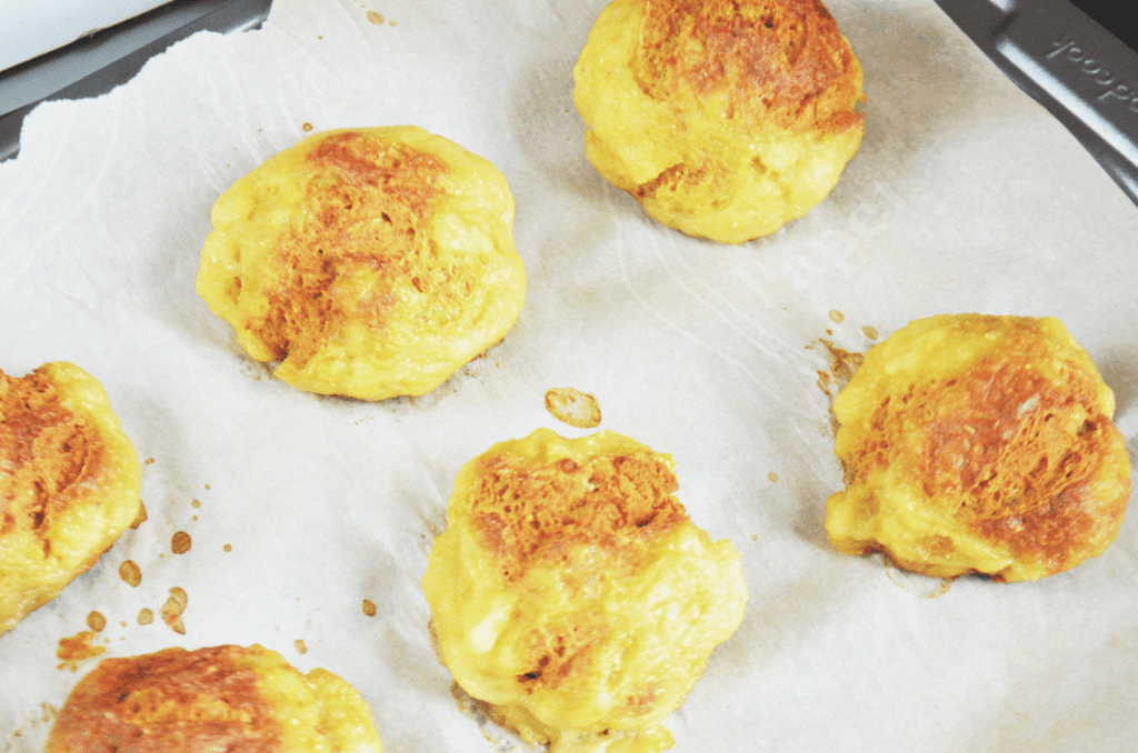 fresh from the oven gluten free bread rolls with browned tops