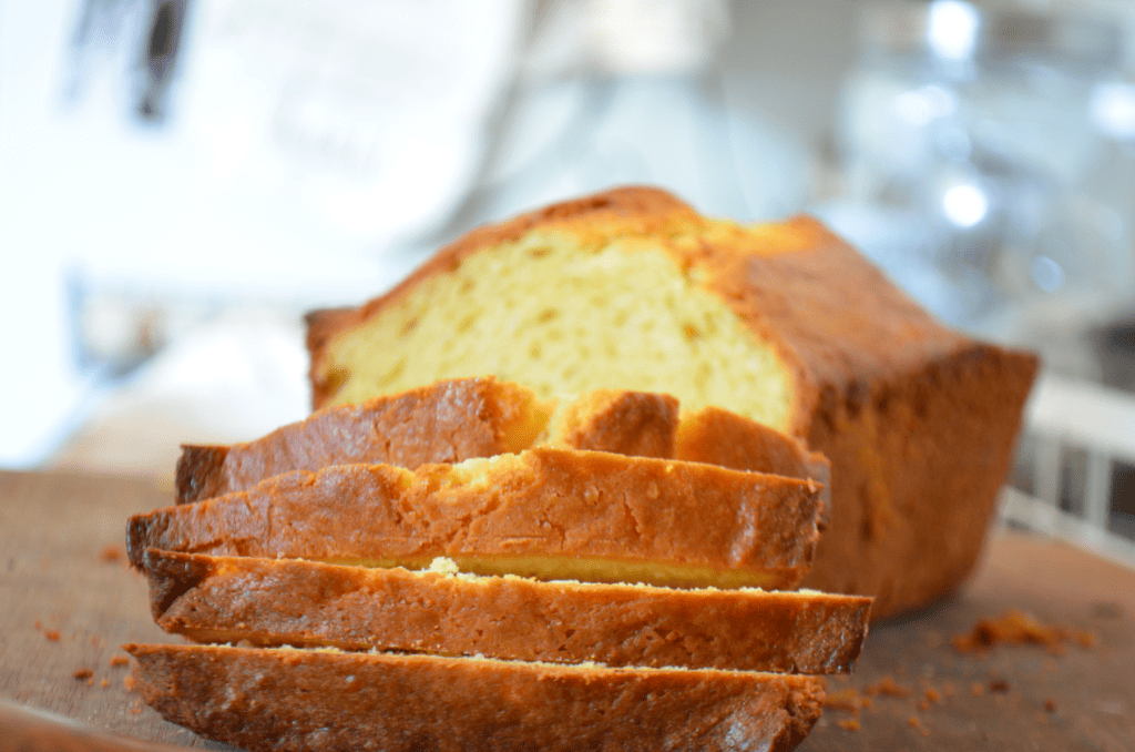 Lemon pound cake slices fall on top of each other ready to eat.