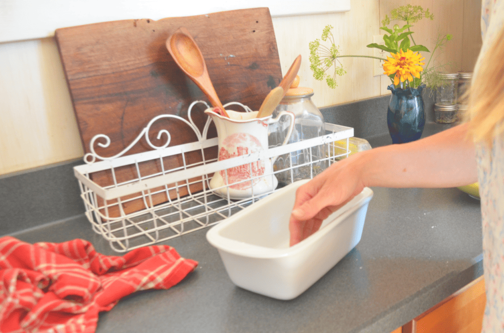 Greasing a bread loaf pan