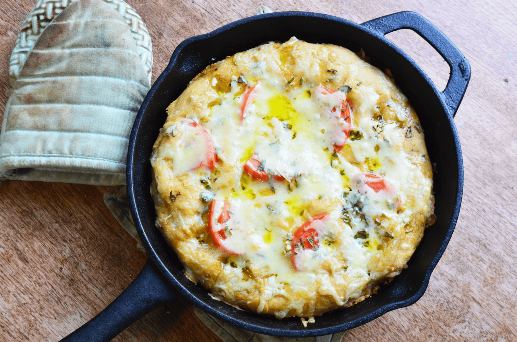 focaccia bread from the grill made in an iron skillet