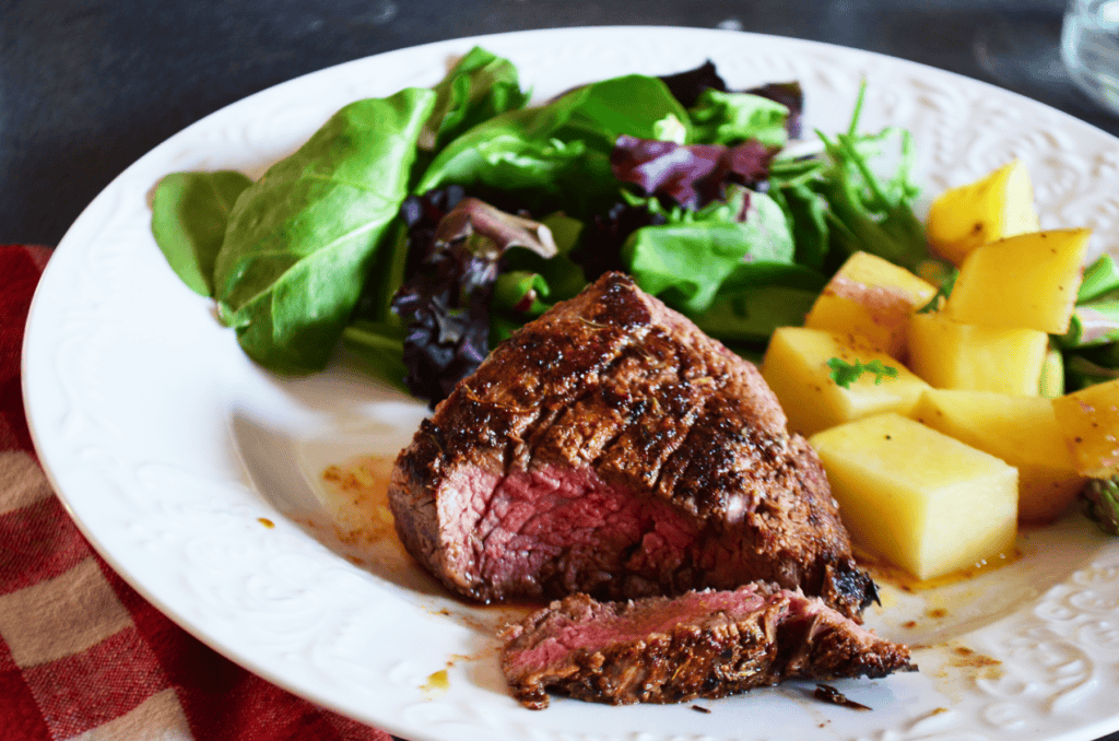 Filet Mignon steak cooked medium well.