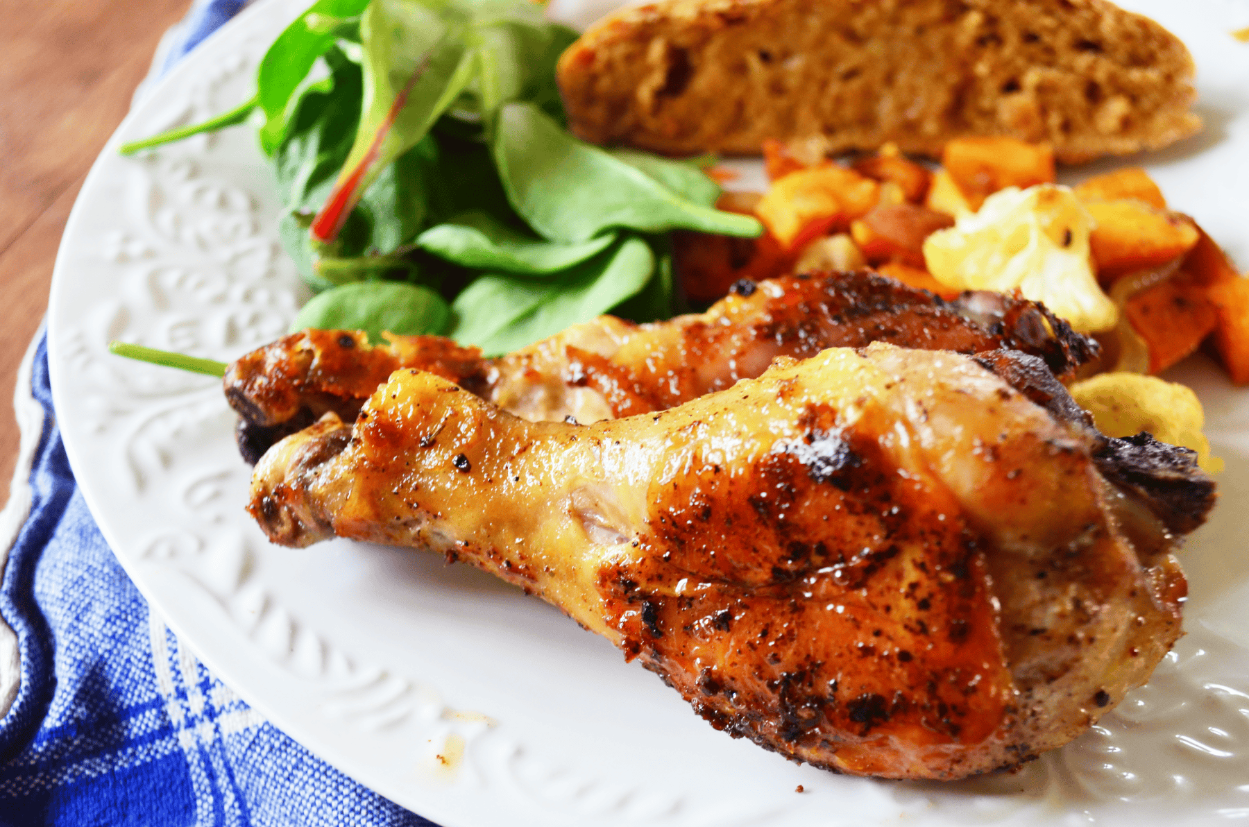 Fried Chicken Baked from frozen is set on a plate with crispy skin and soft meat.
