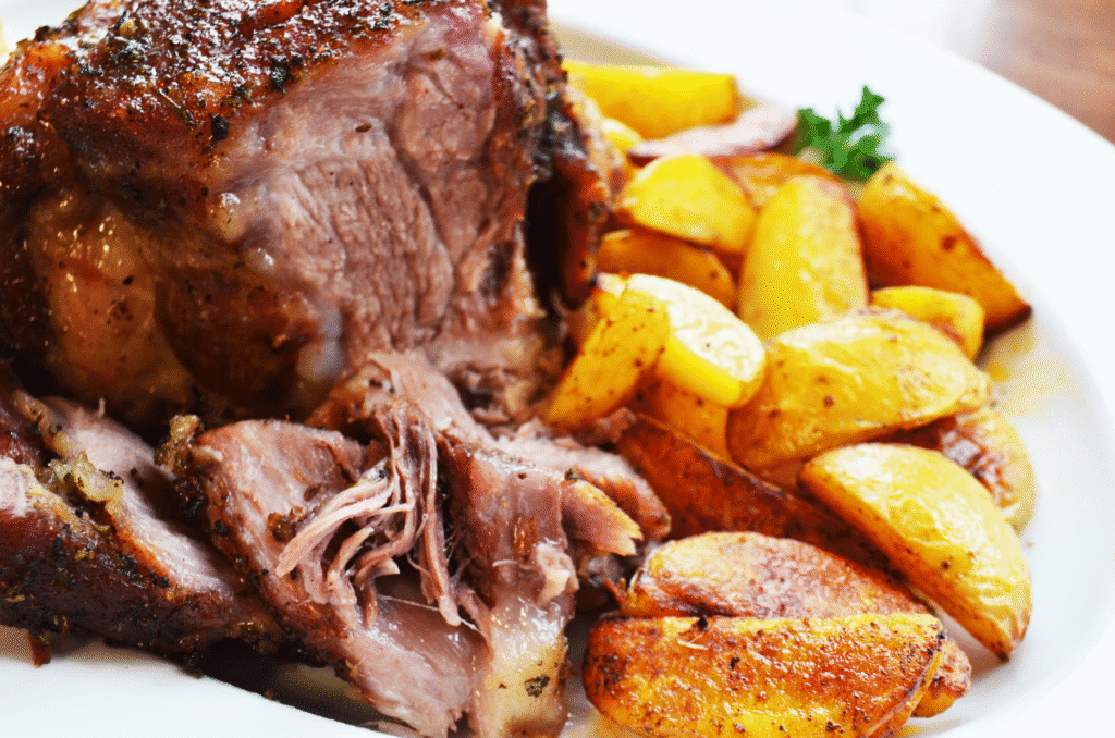 Maple honey glazed pork shoulder with potatoes