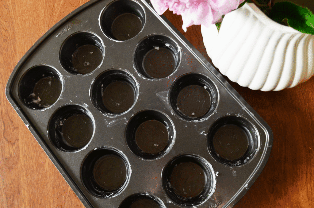 Empty muffin pan on counter top