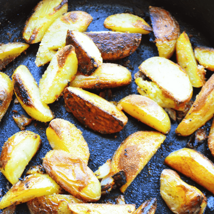 fried potatoes freshly baked in a cast iron skillet